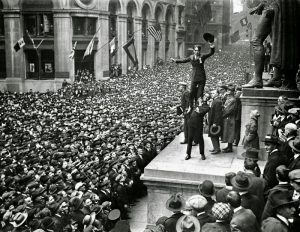 Chaplin and Fairbanks entertain a crowd on Wall Street, 1917