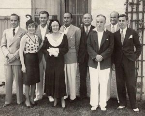 Movie stars and executives of United Artist Corporation. Ca. Nov. 10, 1930. L-R: Al Jolson, Mary Pickford, Ronald Colman, Gloria Swanson, Douglas Fairbanks, Joseph Schenck (Pres,. And Chrm.), Charlie Chaplin, Samuel Goldwyn, Eddie Cantor