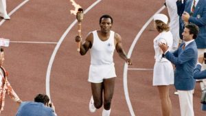 Rafer Johnson carrying Olympic relay torch